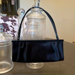 Black evening bag with silver accents from Banana Republic.